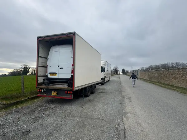 Gentlevan Mercedes Sprinter transhipment van inside the lorry trailer — UK to Spain removals