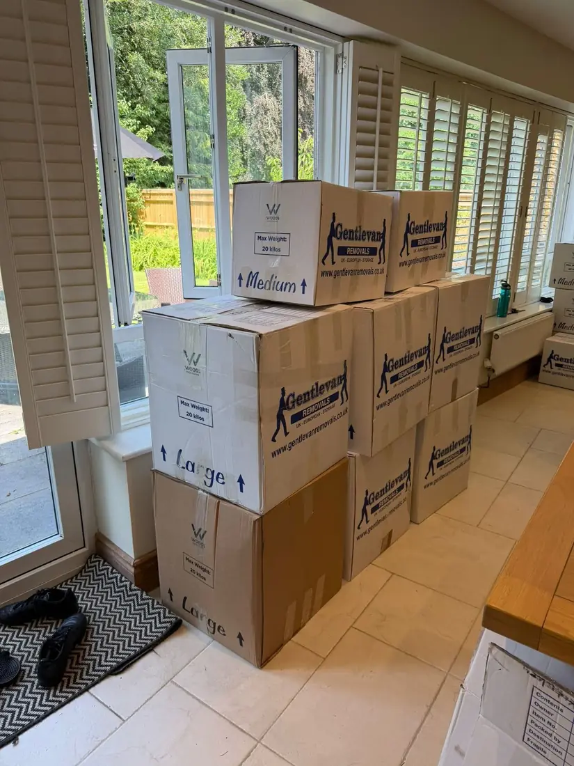 Gentlevan branded cartons packed and stacked ready for collection
