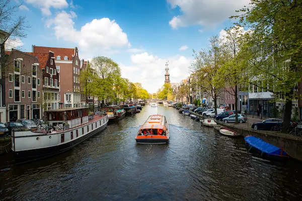 Amsterdam canal houses and bridge — UK to Netherlands removals by Gentlevan