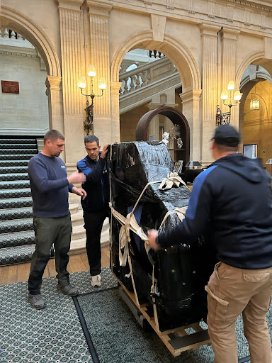 Moving a piano at Heythrop Park Hotel in Enstone, Chipping Norton.