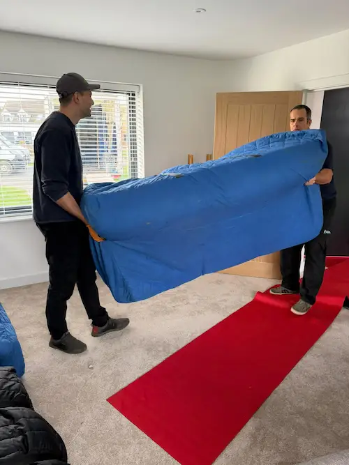 Gentlevan crew carefully moving furniture in the Cotswolds