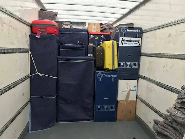 Furniture protection using padded blankets and straps