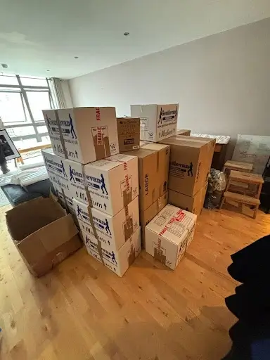 Assorted boxes and furniture ready for part-load removal to Spain